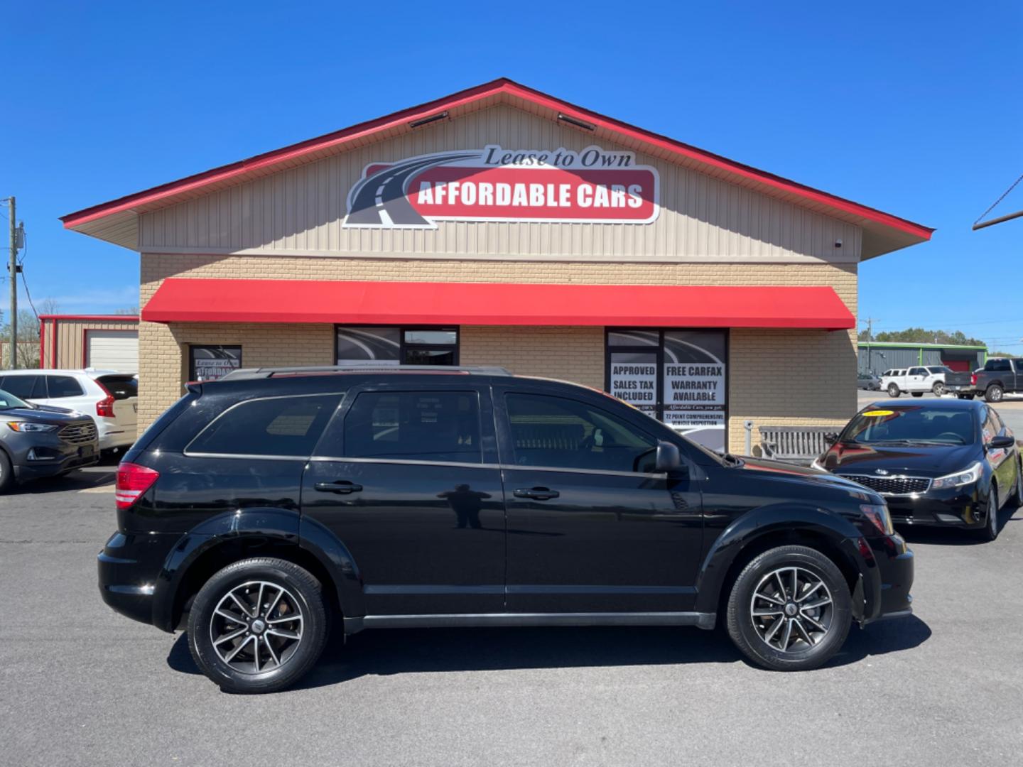 2018 Black Dodge Journey (3C4PDCAB5JT) with an 4-Cyl, 2.4 Liter engine, Automatic, 4-Spd w/AutoStick transmission, located at 8008 Warden Rd, Sherwood, AR, 72120, (501) 801-6100, 34.830078, -92.186684 - Photo#0